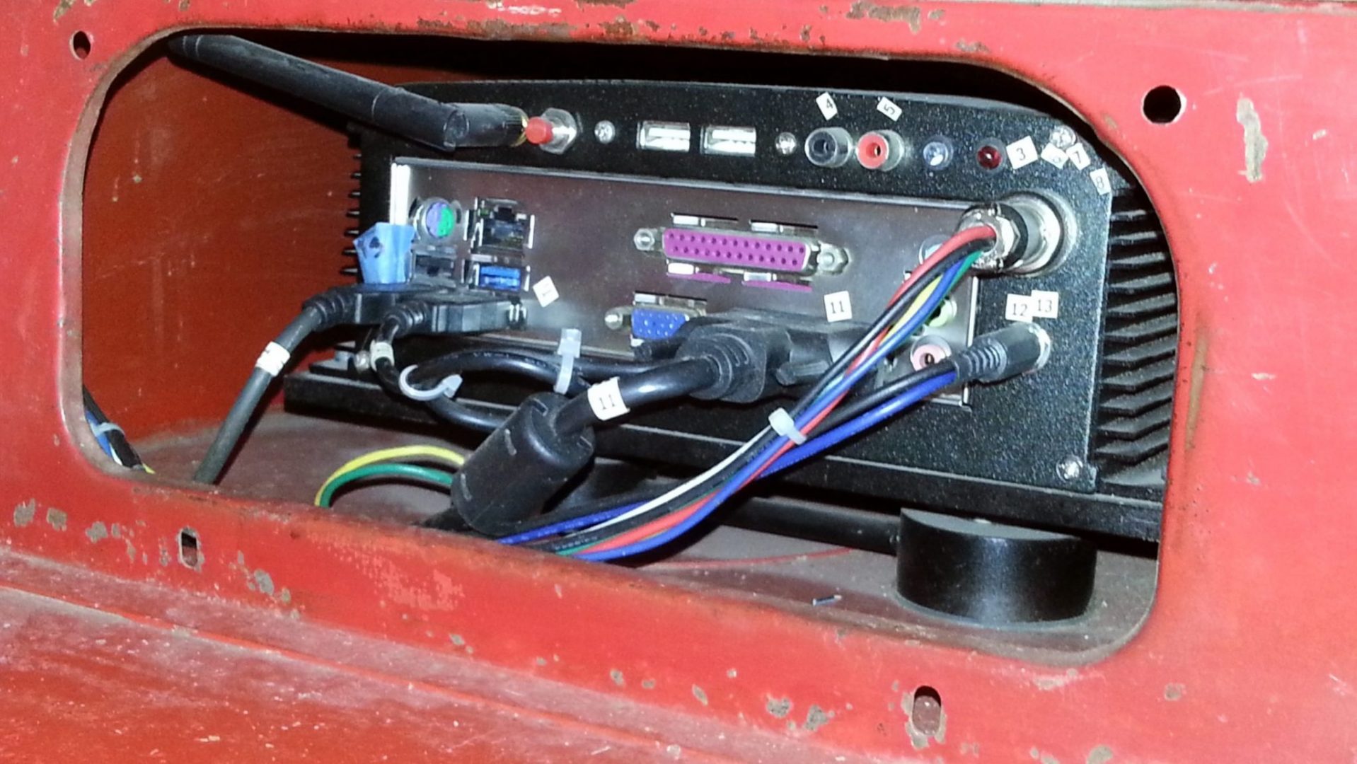 :: Small form-factor Windows 10 PC shown installed in the under-seat passenger side tool box.