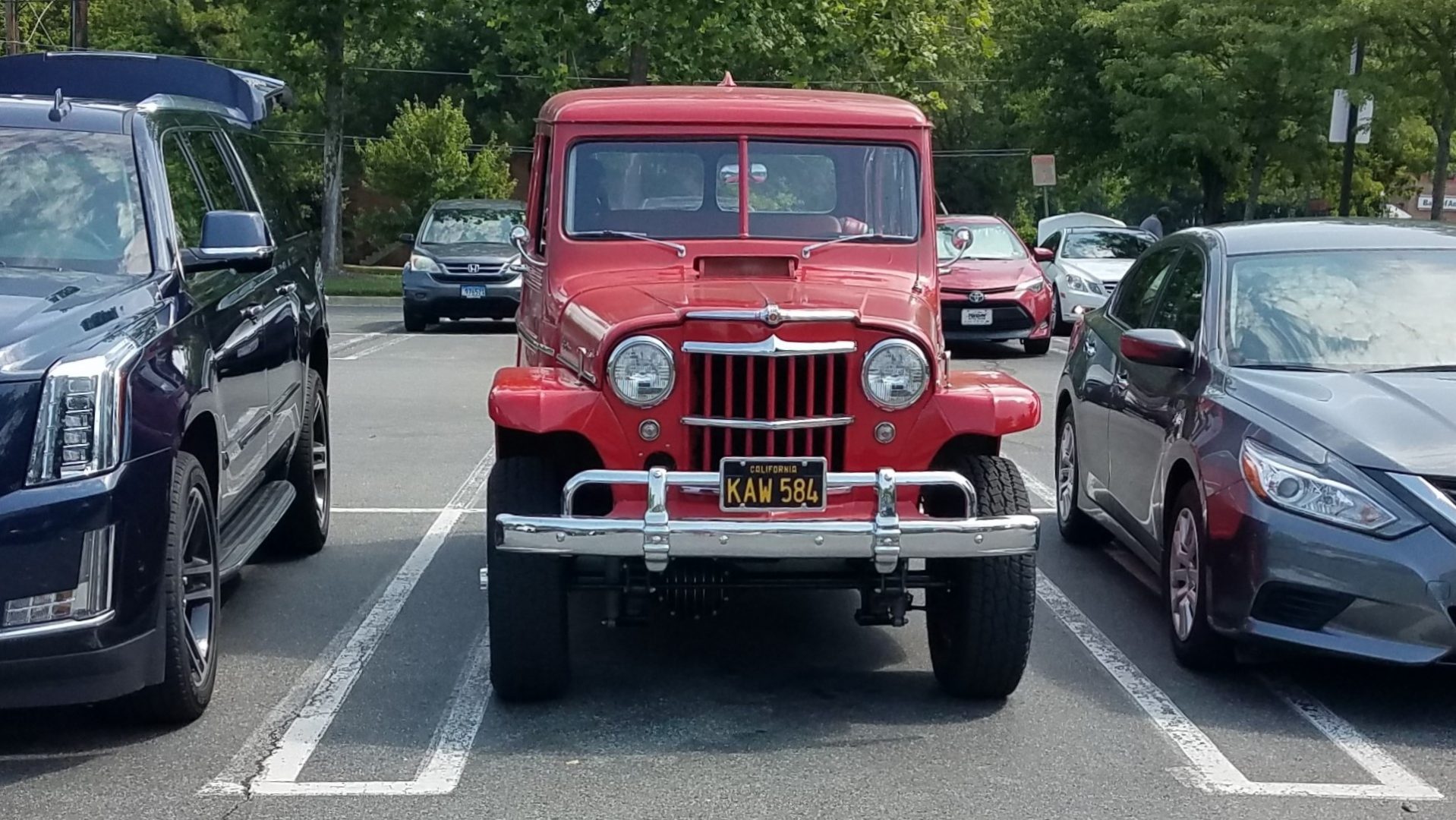 :: Willys Utility Wagon,s agility gets it into a tight parking spot.